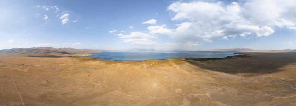 Aerial view, Vast empty landscape at the mountain lake Song Kul in autumn, Moldo Too Mountains, Naryn region, Kyrgyzstan