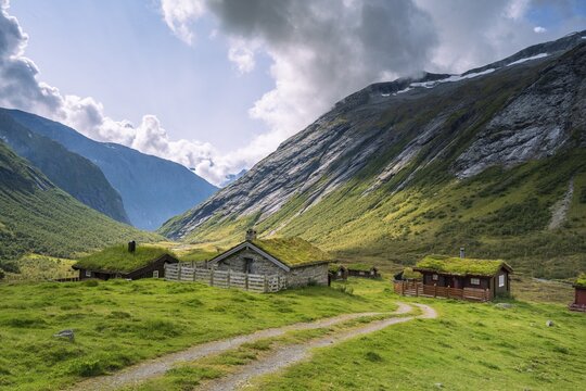 Traditional cabins with grass roofs in the mountain valley, Skjerdingsdalss&aelig;tra, Stryn, Norway