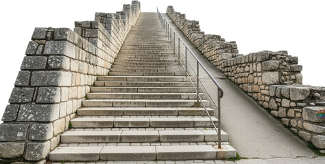 Wide stone staircase with textured walls and a metallic handrail leads upwards into a clear sky suggesting ascent stairs ancient architecture steps masonry worn stone wall transparent background