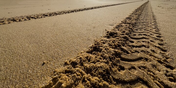 Tire tracks on the sand