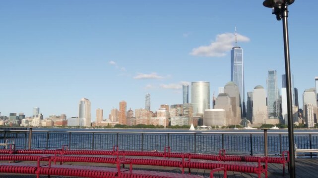 New York City Manhattan downtown financial district skyline, New Jersey Exchange Place, United States. Urban cityscape with skyscraper buildings, World Trade Center. J Owen Grundy park, Paulus Hook.