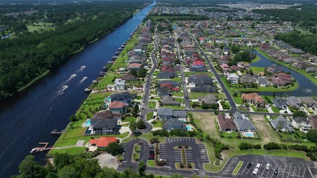 Intracoastal Waterway in Myrtle Beach, SC used for boating and water recreation in coastal South Carolina Low Country  with urban homes by the water