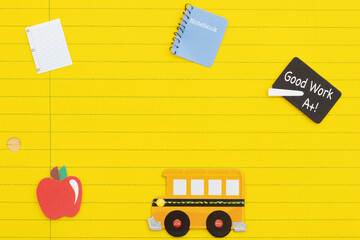 School education background with yellow lined paper