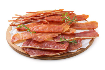 Various types of pork, chicken, and turkey jerky on a round wooden tray, isolated on a white background, authentic photograph, not AI-generated