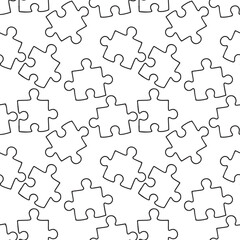 Black and white seamless pattern with hand drawn jigsaw puzzle pieces, suitable for backgrounds, wallpapers, educational themes, psychology concepts, and creative surface design.
