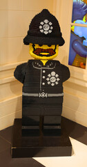 Obraz premium LONDON UNITED KINGDOM 06 19 2023: Lego Police Policeman Minifigure Officer Constable Boy Man Flesh Skin Beard