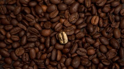 Fototapeta premium Golden Coffee Bean as Symbol of Luxury and Rising Value