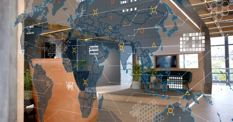 Displaying clear glass partition showing AR map overlay in office lobby, with tan leather seating