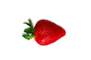 Single fresh strawberry with water drops on white background - Top view macro.