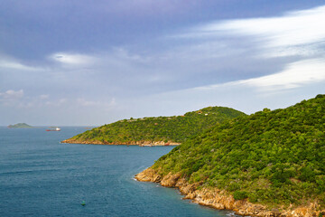 St. Thomas sunrise with ship, mountains, and sky