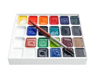 A white tray holds numerous colorful square paints and a paintbrush