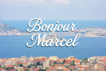 A blurred view of the coastal city of Marseille and the Mediterranean Sea  in the foreground, the inscription "Bonjour Marcel" in large font. A postcard or banner for tourism and greetings. © nina blez