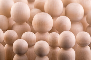 Large group of wooden people figurines