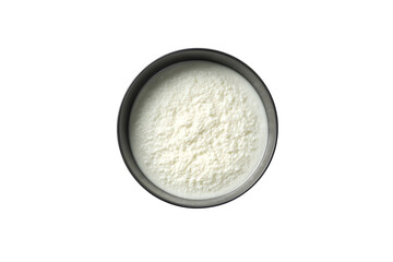 White powder in a bowl on a black background