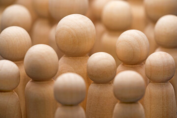 Large group of wooden people figurines