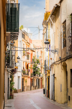 Narrow street in Castellon de la Plana with vibrant facades