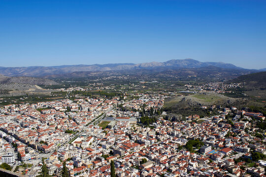View of the cityscape of Argos with surrounding mountains