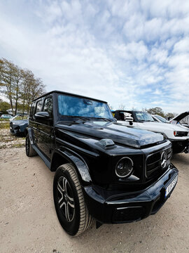 Black electric Mercedes-Benz G 580 EQ Technology W 465 Wagon on Display at Car Show Showcasing Luxury, Power, and Bold Style
