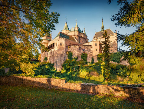 Spectacular autumn view of Castle of Spirits (Bojnice Castle). Impressive morning cityscape of Bojnice, historical town in east Slovakia located on the Nitra river. Traveling concept background.