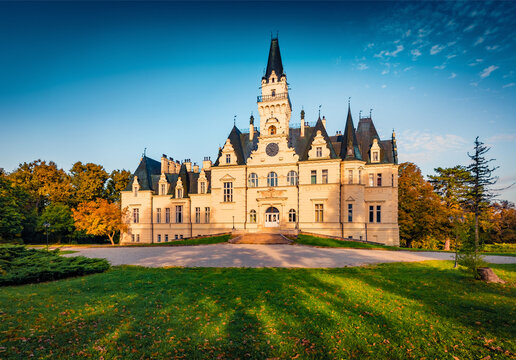 Sunny autumn view of Budmerice Castle. Beautiful morning cityscape of Budmerice village, municipality in western Slovakia, Pezinok District in Bratislava region. Traveling concept background.
