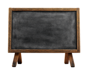 Vintage blank black chalkboard with a rustic wooden frame stands on a small easel, featuring a textured surface with faint chalk dust for a classic, retro aesthetic