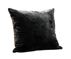 Black textured decorative pillow with a metallic silver sheen and woven pattern is dramatically lit from the side, creating a luxurious and elegant mood