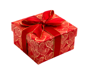 Square red gift box decorated with a golden heart pattern and tied with a shiny red and gold ribbon bow, presented as a surprise for a romantic celebration