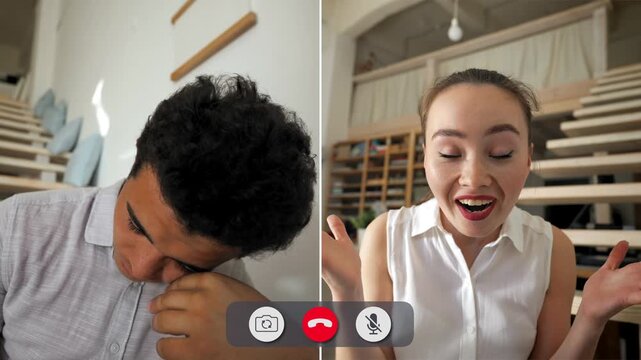 A man looks bored during an online call while a woman talks animatedly. They are having a conversation in a bright room with stairs in the background.