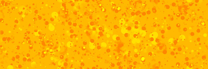 Abstract seamless background. Sprinkling of orange and light yellow paint on a yellow field.