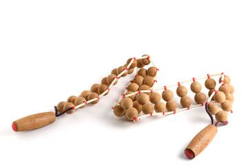 Wooden roller, ribbon massager on white background.