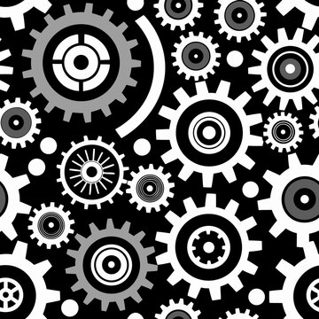Title: A pattern of interlocking gears in black white and gray with various sizes and