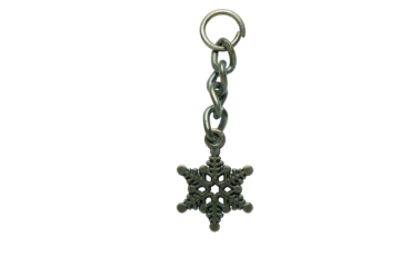 Vintage metal snowflake charm with chain on transparent background
