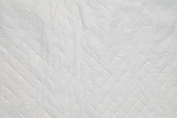 Naklejka premium Quilted white fabric texture with diamond pattern 