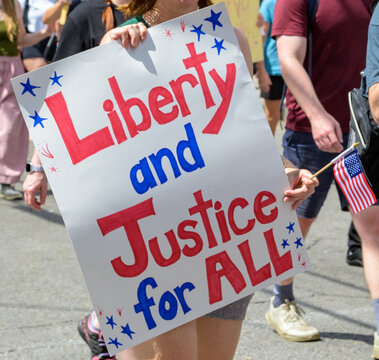 Closeup of "Liberty and Justice for All" Sign at the No Kings March in New Orleans on June 14, 2025