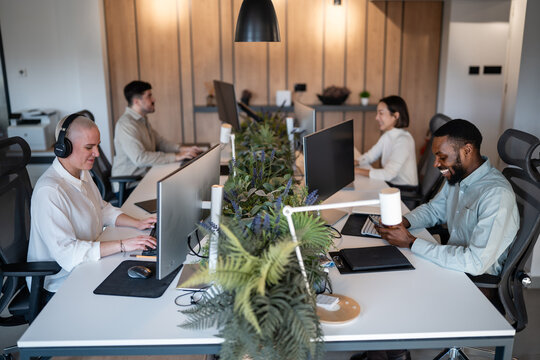 Diverse business people working in modern office environment