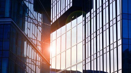 Modern office building exterior made from glass and steel. Windows of office building. Abstract...