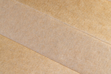 Fototapeta premium solid yellow cardboard for packaging goods and products, a part of corrugated cardboard for packaging goods