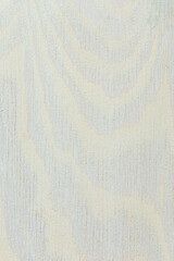 Unpolished pine plywood with a coarse surface, painted white wood stain. Background for artwork.