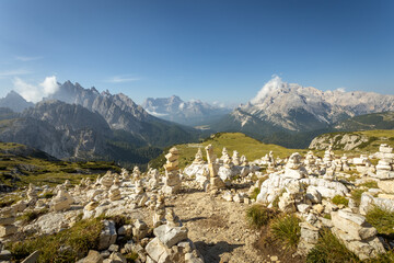 Sunset landscape of the Dolomites near Tre Cime with alpine meadows and dramatic peaks