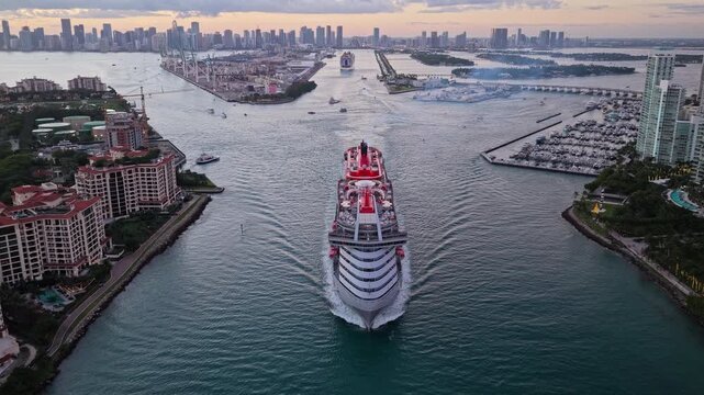 Miami, Florida, USA - July 11, 2025: Cruise summer vacation. Virgin Voyages cruise line. Cruise ship tour. Travel at sea. Ship leaving Miami beach port. Resilient Lady cruise ship voyage