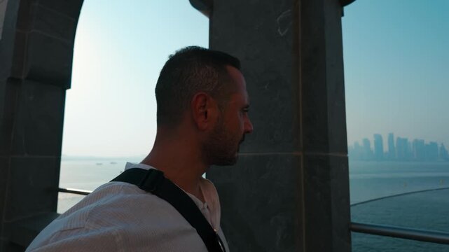 A tourist man visit Islamic Art Museum in Doha, Qatar