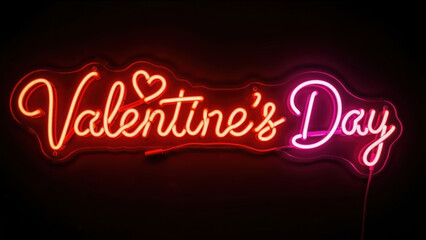 Valentine's Day neon sign glowing on black background. Red and pink script text with heart symbol. Romantic holiday decoration concept with copy space