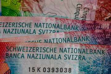 Detail of Swiss Franc banknotes representing economy and inflation in Switzerland