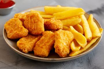 Homemade Chicken Nuggets and Potato Dippers with Ketchup