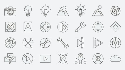 A professional photographer capturing a high-angle lifestyle shot of a creative workspace with a digital camera on a tripod in a bright modern studio