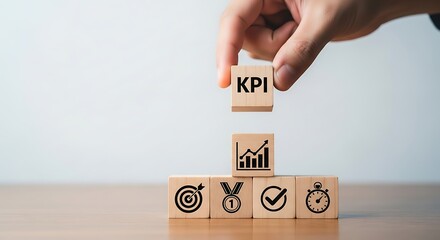Hand placing K P I block on wooden cubes with business key performance indicator success growth