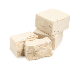 Pieces of fresh yeast isolated on white