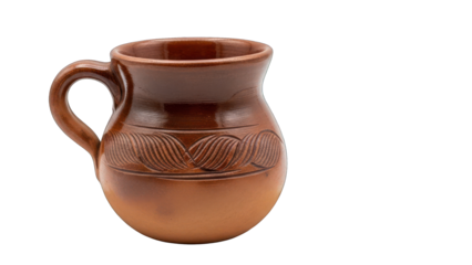 Ceramic brown mug with handle, patterned embellishments, set against a black backdrop