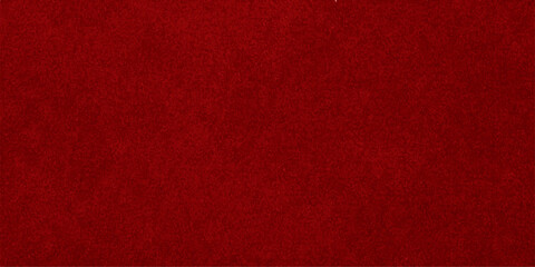 Fototapeta premium A dark red vintage paper and textured fabric background with a rough grunge pattern on a blank canvas surface for a Christmas textile wallpaper design
