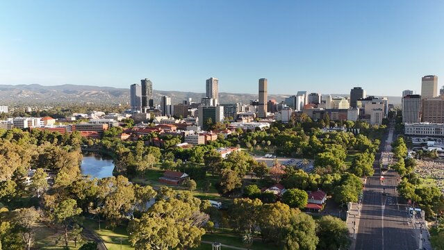 Adelaide City, South Australia &ndash; Aerial Drone View of City Skyline, CBD, urban landscape, River Torrens, Parklands, Adelaide Oval, Hospitals, University and North Adelaide at Sunset